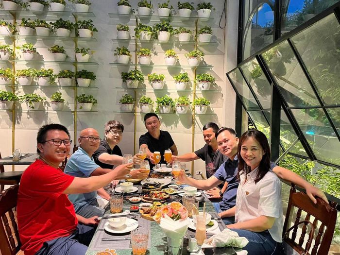 Diners enjoying their meals at the restaurant - Image 3
