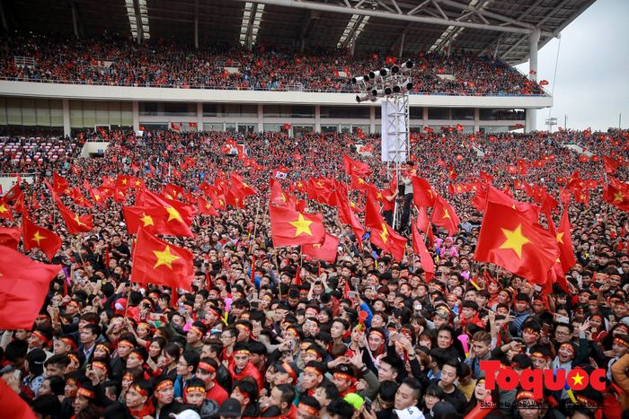 Fans from all over gathered at My Dinh to cheer on the Vietnam national team during their match, as shown in image 2.