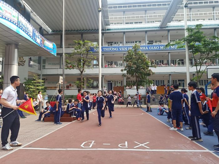 This image captures the vibrant atmosphere of Cau Giay Secondary School, where students excel academically and actively engage in extracurricular activities such as sports, cultural festivals, and community service.