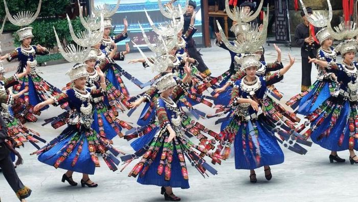 Miao girls performing dances at the Love Festival