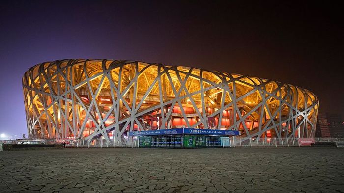 The Bird's Nest Stadium stands out when illuminated at night