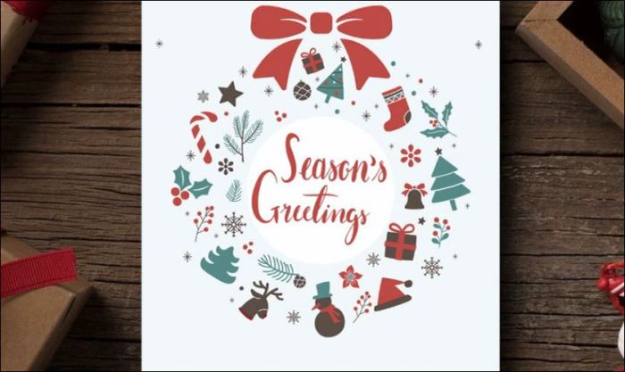 Mẫu thiệp Noel được thiết kế với hình vòng nguyệt quế