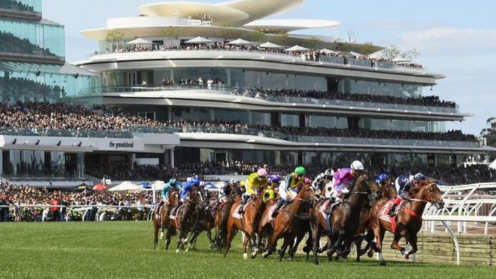 Visitors enjoy the Melbourne Cup festival amidst the comfortable weather of Australian October.