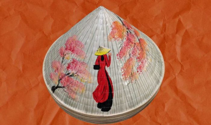 Vẽ nón trang trí với hình ảnh cô giáo và cây phượng vĩ, tượng trưng cho sự dạy dỗ và tình cảm thầy trò.