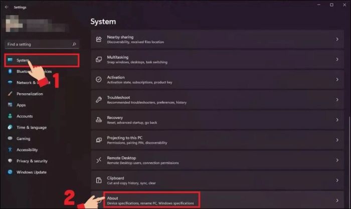 Chọn System, kéo xuống và nhấp vào mục About