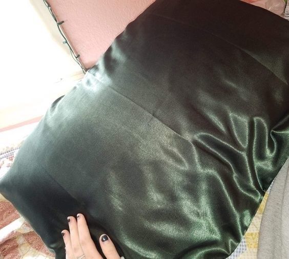 reviewer's dark green satin pillowcase