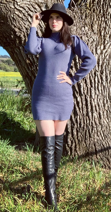 reviewer showcasing the navy blue dress