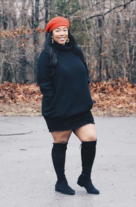 Reviewer wearing a black dress