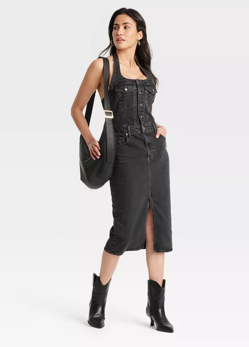 model wearing a black halter dress