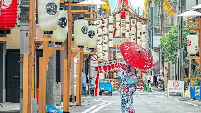 The streets of the Gion Festival are adorned with vibrant lanterns