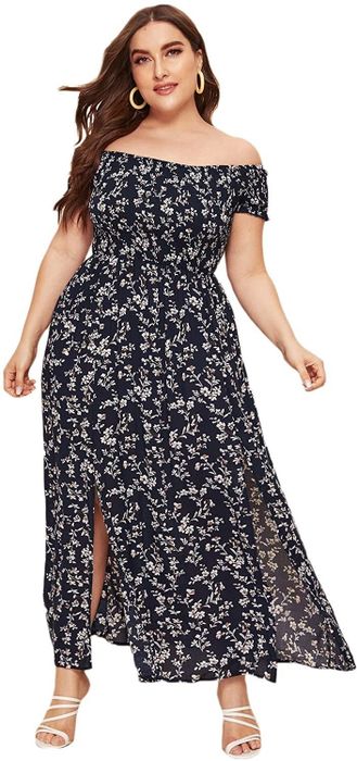 model wearing the black dress with a floral pattern