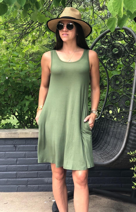 reviewer wearing a green dress