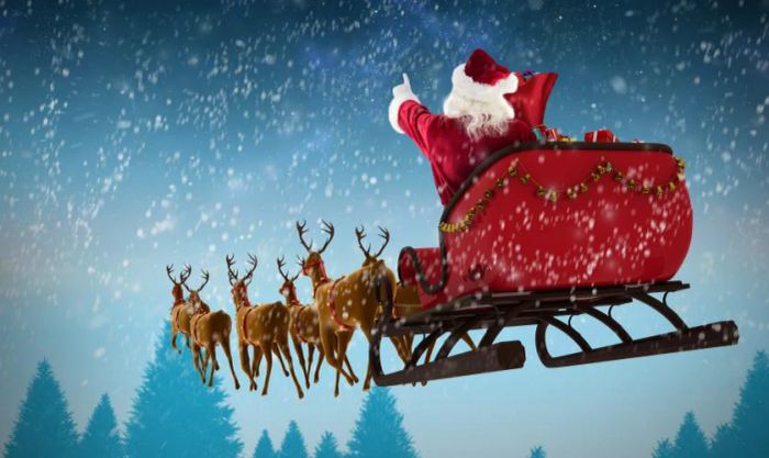Hình nền ông già Noel đang cưỡi trên lưng tuần lộc