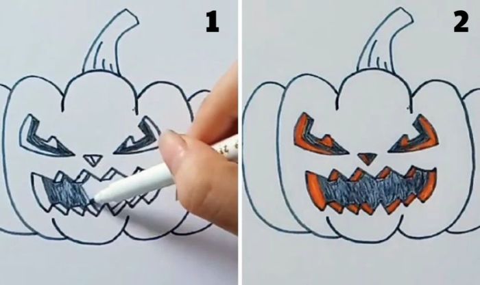 Tô màu mắt, mũi và miệng quả bí ngô Halloween vừa hoàn thành