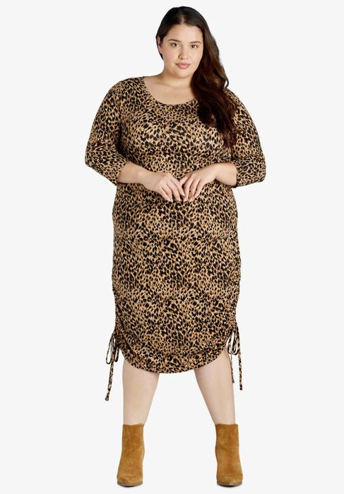 Model wearing the leopard print dress.