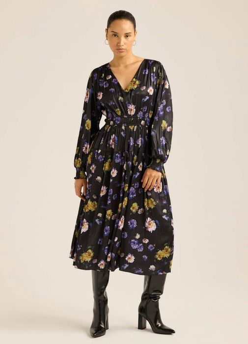 A model showcasing a beautiful floral dress