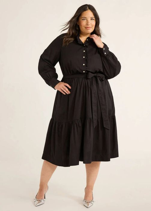 A model showcasing the chic black dress