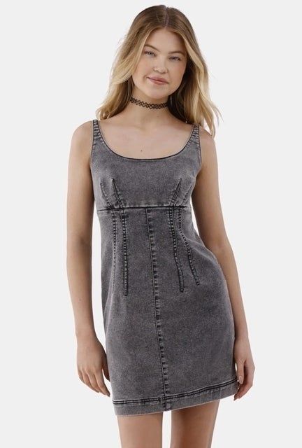 A model flaunting the dress