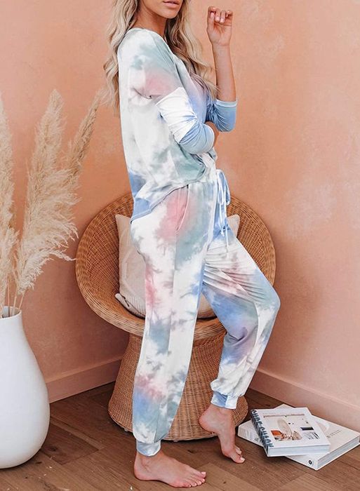 Side view of a model wearing the tie-dye loungewear set