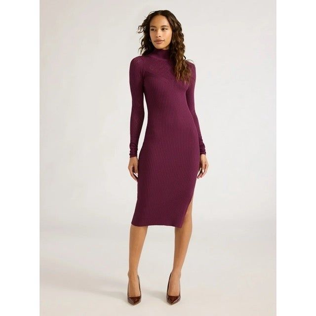 A model stands confidently wearing the dress