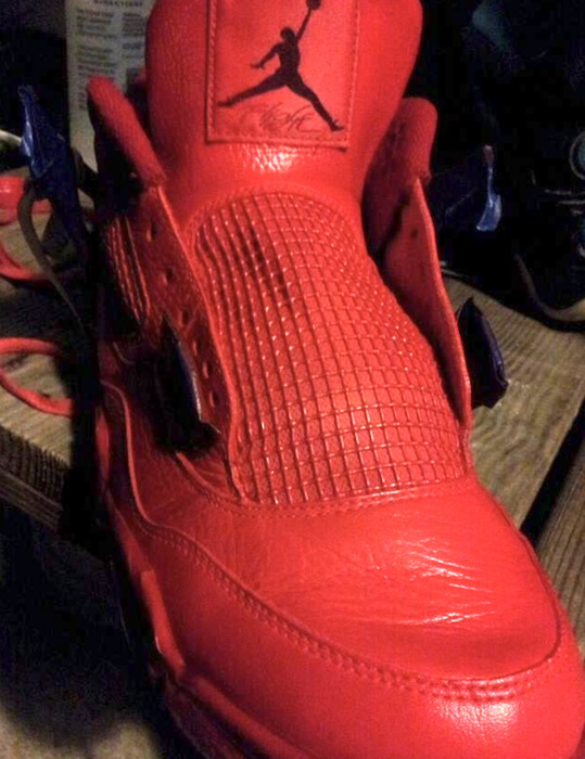 The same shoes after being painted entirely red