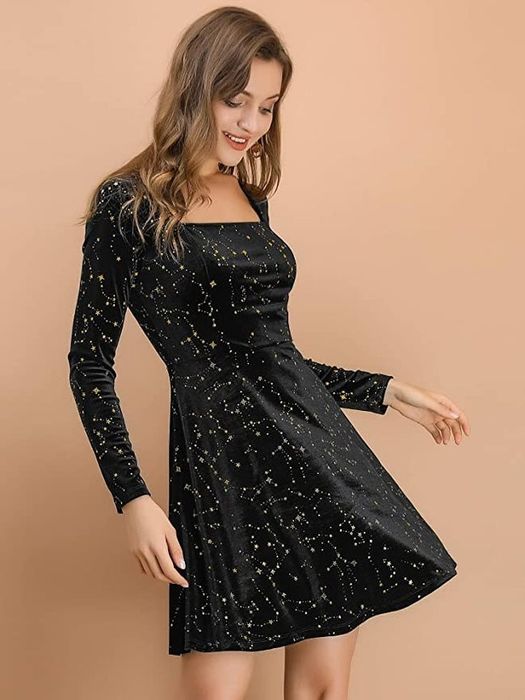 model in a skater-style star print velvet dress