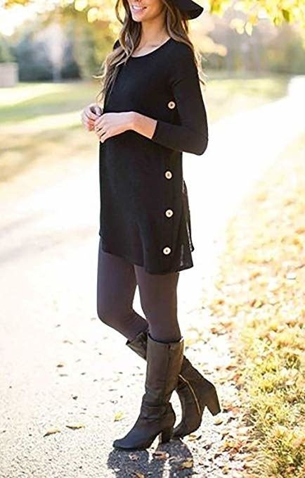 The model is wearing a tunic featuring side buttons, styled with tights and knee-high boots.