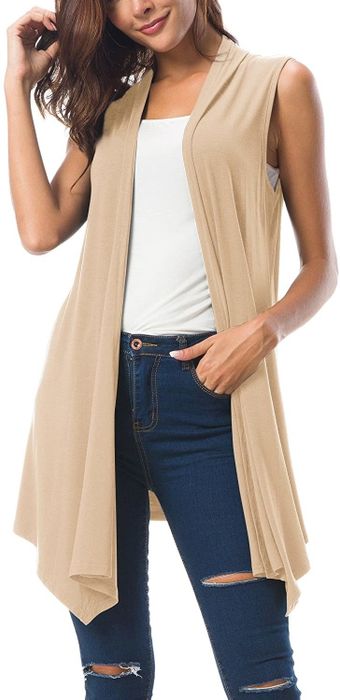 Model showcasing the sleeveless cardigan in apricot