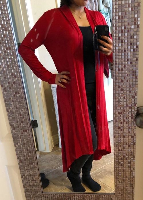 Reviewer modeling the red duster cardigan