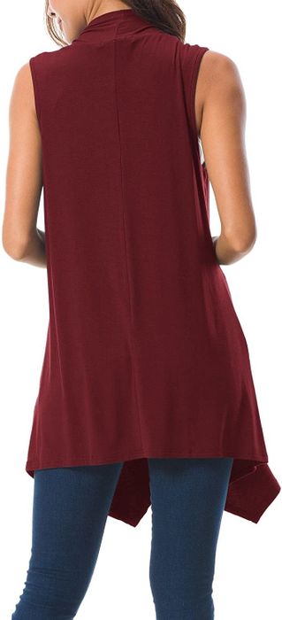 Model wearing the sleeveless cardigan in wine red