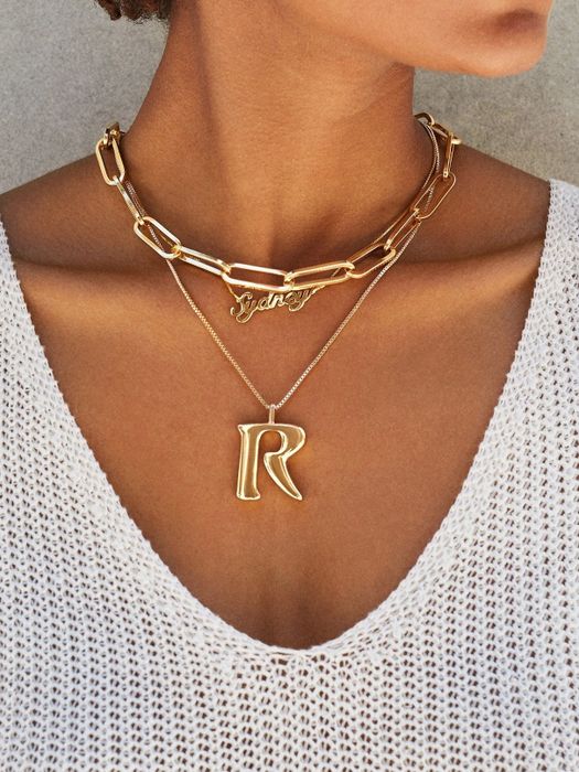Model wearing the gold link necklace