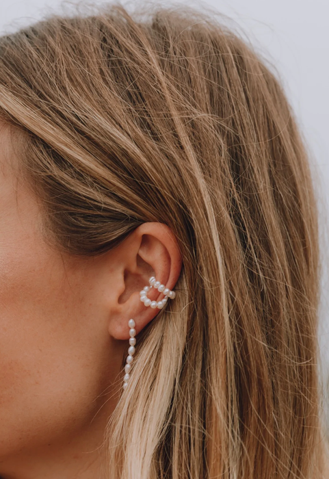 model wearing the pearl ear cuff