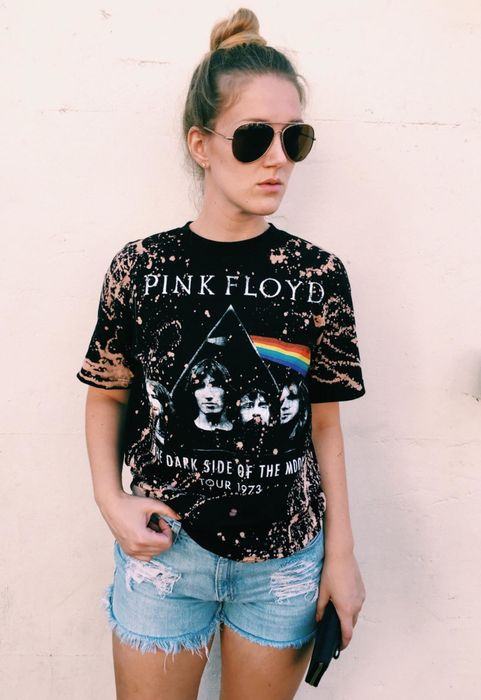 A model wearing a tie-dye Pink Floyd top