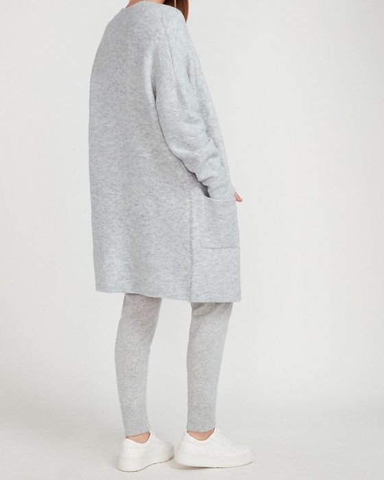 A model wearing the gray cardigan with pockets