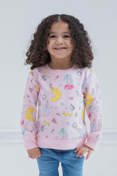 A child wearing a charming pink Disney Princess sweatshirt