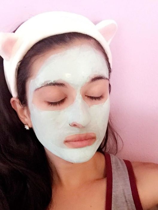 reviewer wearing a headband with cute cat ears