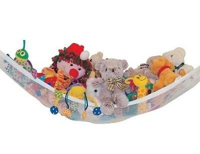 a toy hammock filled with stuffed animals