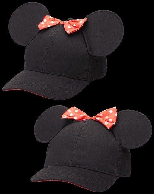 Two Mickey Mouse ear hats, one featuring a red and white polka dot bow, showcased for a shopping feature.