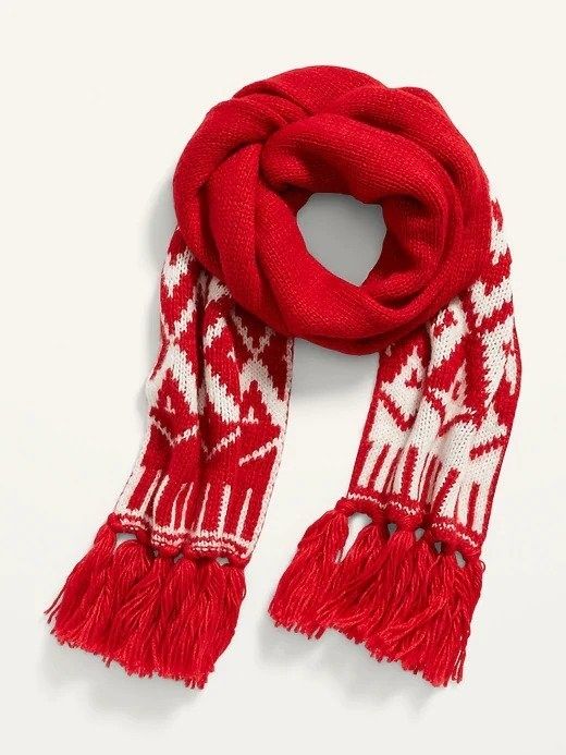 A red and white scarf with fringes hanging from the bottom of both sides.
