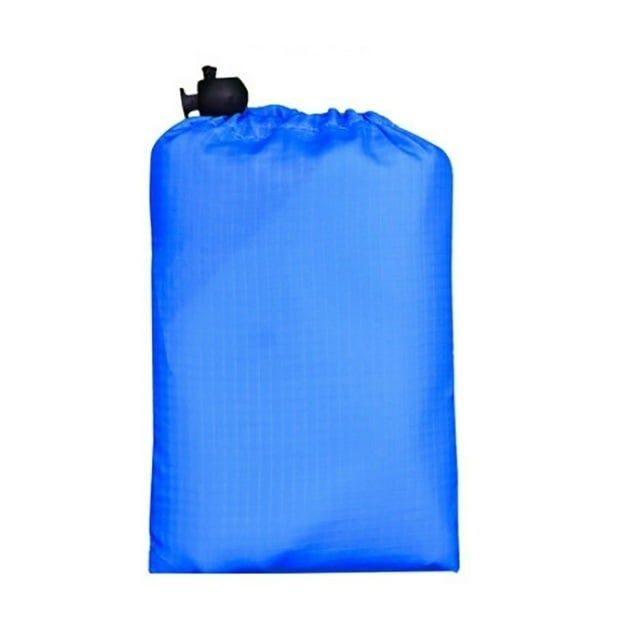 A blue camping blanket neatly folded and sealed.