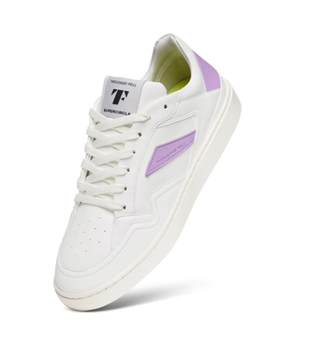 women’s court sneaker featuring light purple accents