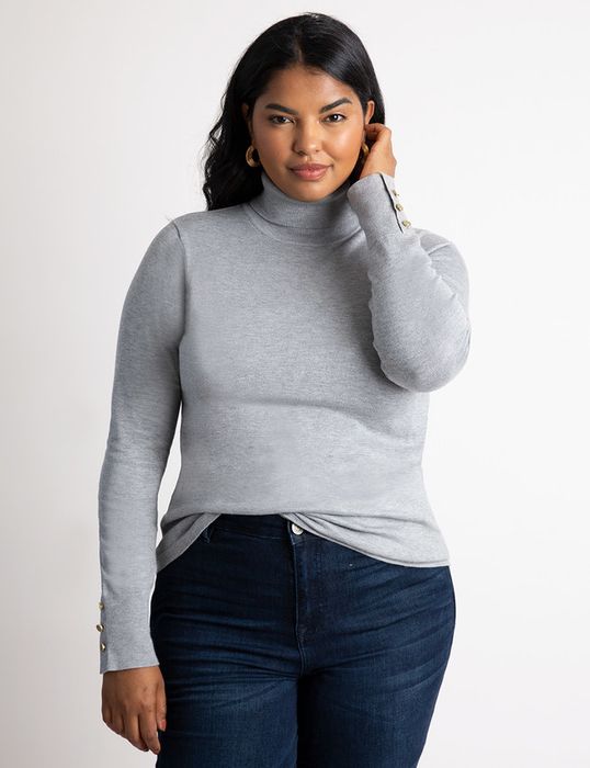 A model wearing a gray turtleneck sweater