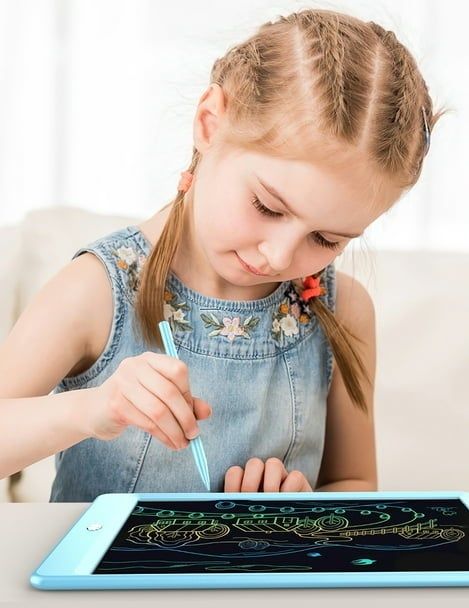 A girl sketching on a reusable drawing tablet