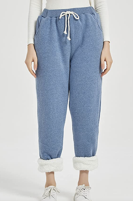 model showcasing light blue Sherpa-lined joggers