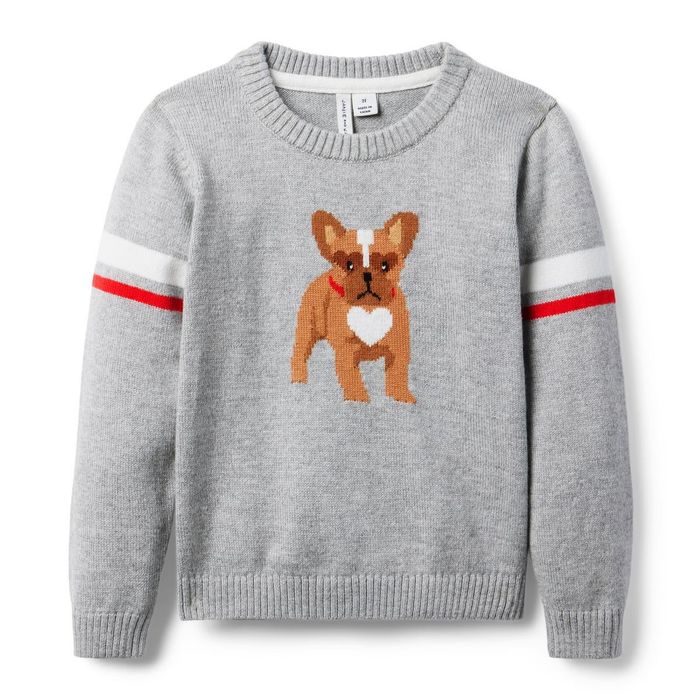 A boy’s sweater featuring a dog design with a heart-shaped patch on its chest