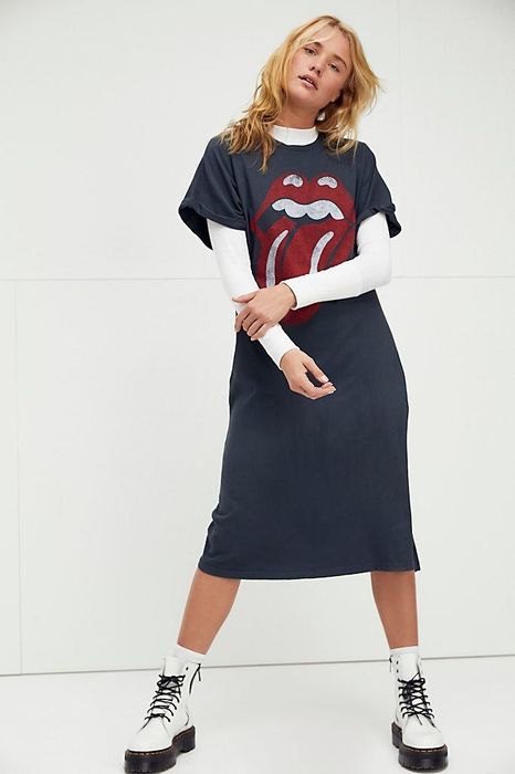 A model wearing the black Rolling Stones dress