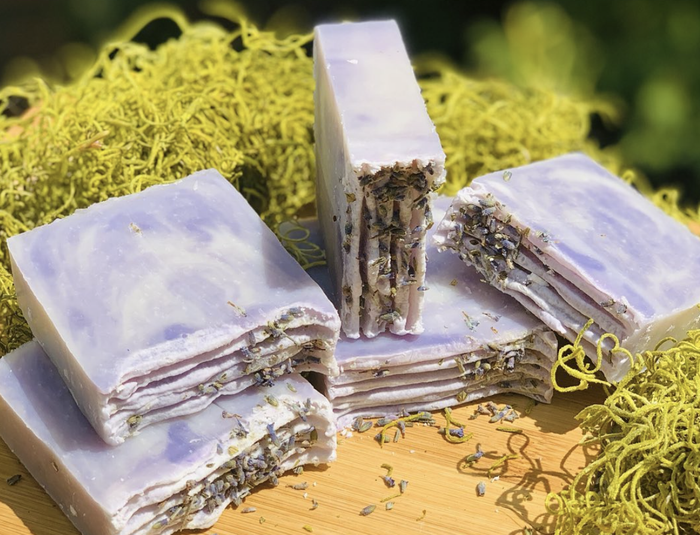 a stack of lavender bars, showcasing the embedded petals