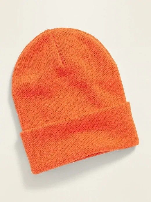 A vibrant orange cuffed beanie