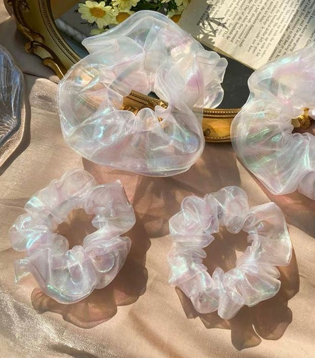 the clear iridescent scrunchies available in small and large sizes
