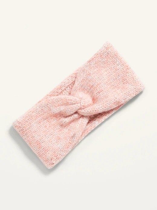 A pink ear warmer that combines style with warmth.